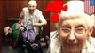 College student helps old lady: Hunk Cesar Larios lets old lady sit on his back
