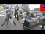 Fight on camera: drunk cyclist fights motorist in the streets of Taipei
