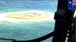 Stranded snorkelers rescued in Australia after writing huge SOS on sandbar