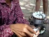 CAMBODIAN WOMAN EATING DUCK EMBRYO, EATING BALUT,  CAMBODIA 2015, DUCK EMBRYO IN CAMBODIA,