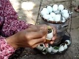 CAMBODIAN WOMAN EATING DUCK EMBRYO, EATING BALUT,  CAMBODIA 2015, DUCK EMBRYO IN CAMBODIA, BALUT