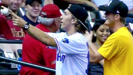 Lucky Fan Catches Two Foul Balls in One At-Bat