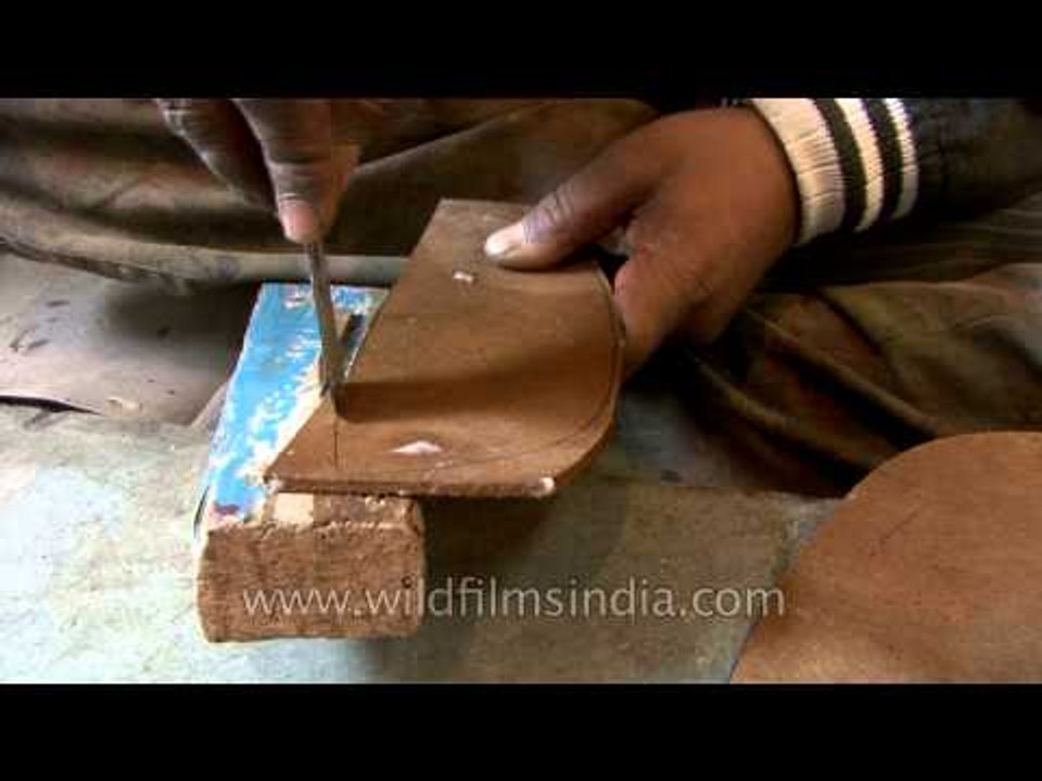 Hand-made leather boots being made from scratch