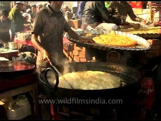 Giant shaped Halwa poori pan fried for Eid celebrators