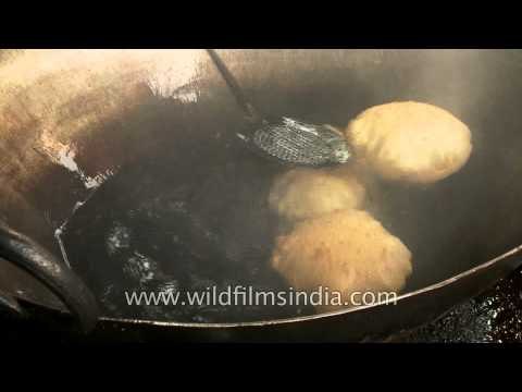 How to fry a bhatoora? Watch how its done in Chandni Chowk, Old Delhi