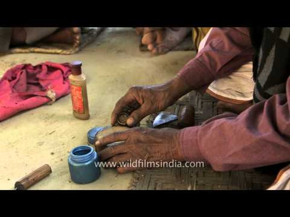 See how an Indian godman presses weed and makes his 'Chillum'