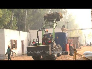 Loading silage for Cattle feeding at Adayana Dairy, Punjab
