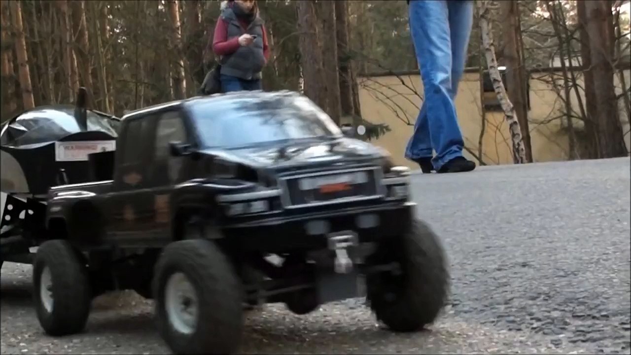 Scale 4x4 rc truck Gmc topkick towing and launching a speed boat