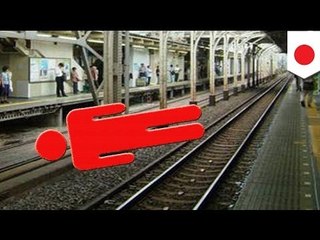 Train runs over Japanese office worker but no one notices