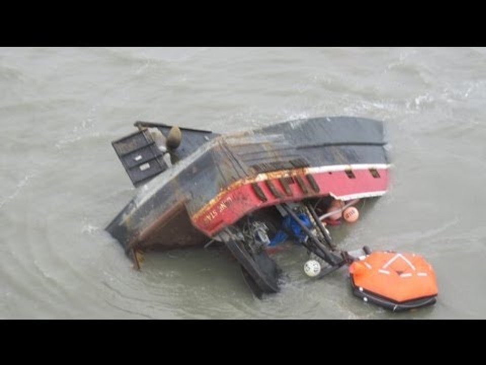 Six rescued from capsized barge in Singapore, five still missing