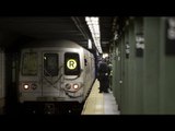 Man falls on subway tracks, survives by diving underneath train