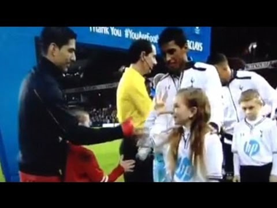 Luis Suarez handshake snubbed by 10-year-old girl mascot