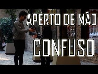 APERTO DE MÃO CONFUSO