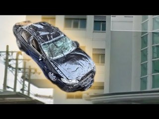 Thai elderly couple survives three-story plunge in car accident