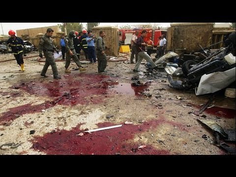 Bombings in Iraq targeting police, pilgrims and city mayor kill at least 22