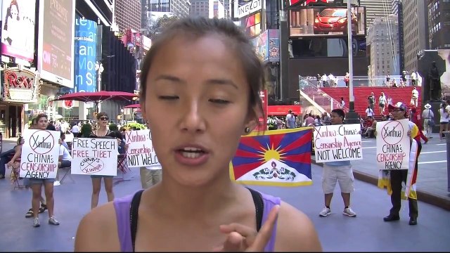 China's Xinhua News Takes Over NYC Times Square - Students for a Free Tibet Takes Action!