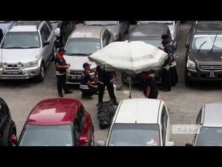 Assassin caught on camera in Malaysia banker shooting death