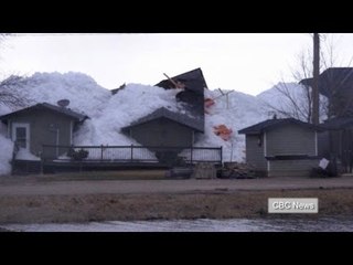 Wall of ice causes Canada home destruction