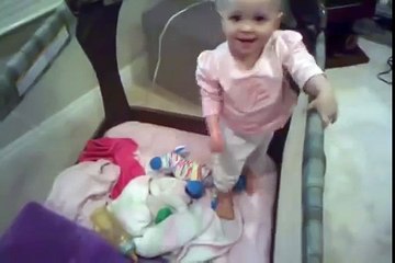 One-year-old talks her way out of a nap