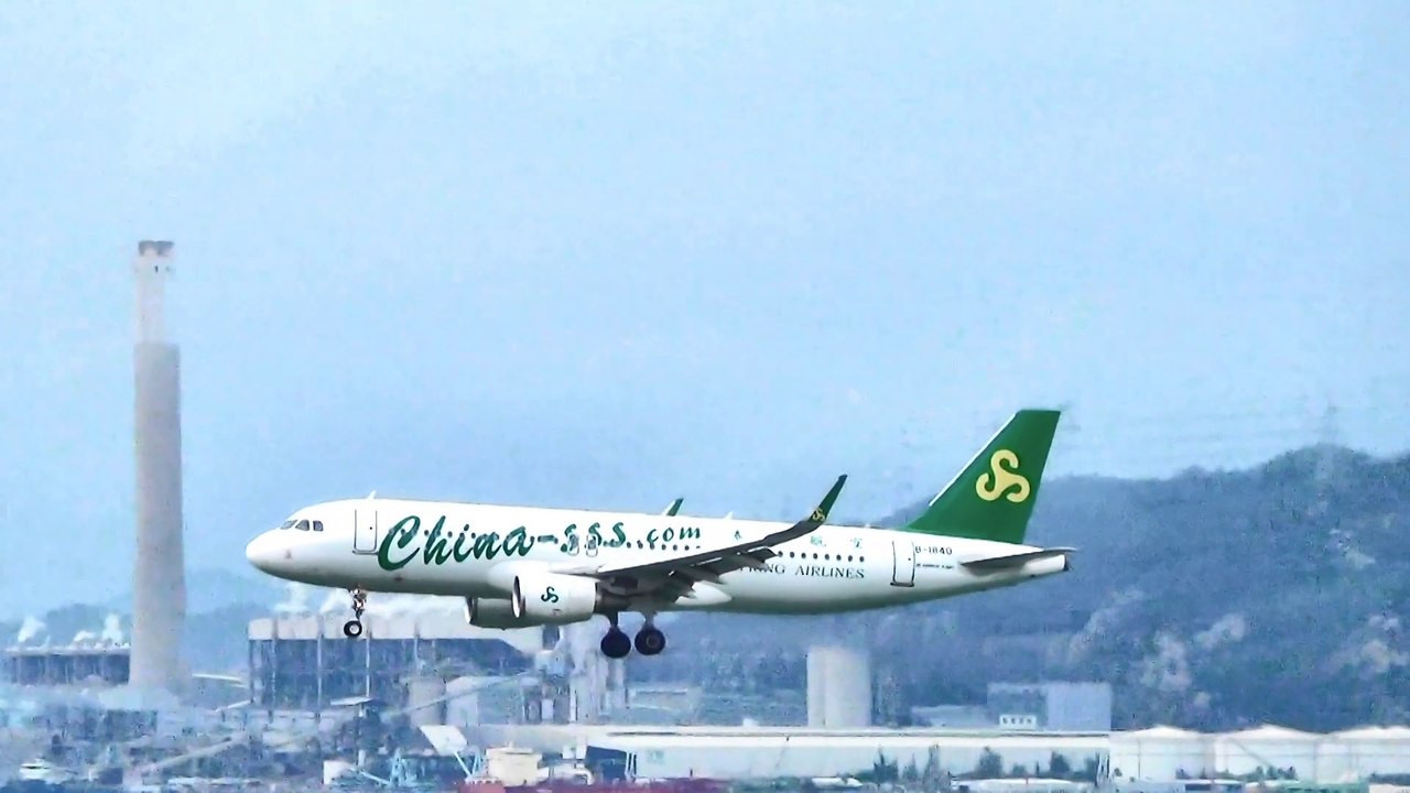 Airbus A320 China Spring Airlines. Landing in Hong Kong Airport. Flight 9C8959 from Shanghai