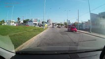 Car makes a left turn from being parked on the right side of the road, cutting me off in the process