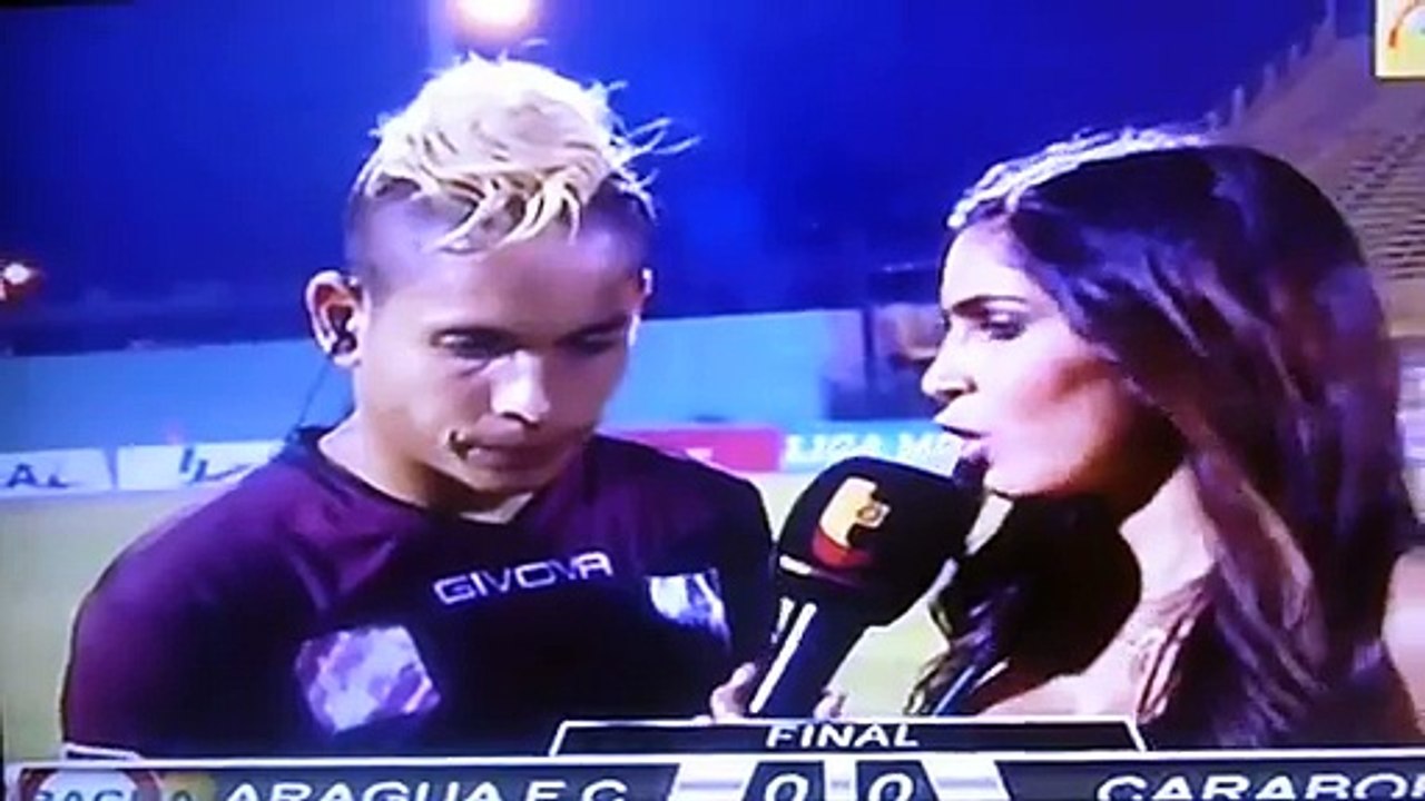Ouch! Venezuelan footballer kicked by rival fan during live interview