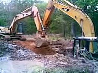 Cat Caterpillar 330 excavator stuck in lake