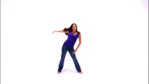 Shot of a dancing girl in a purple shirt and jeans.