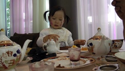 Girl Having Afternoon Tea
