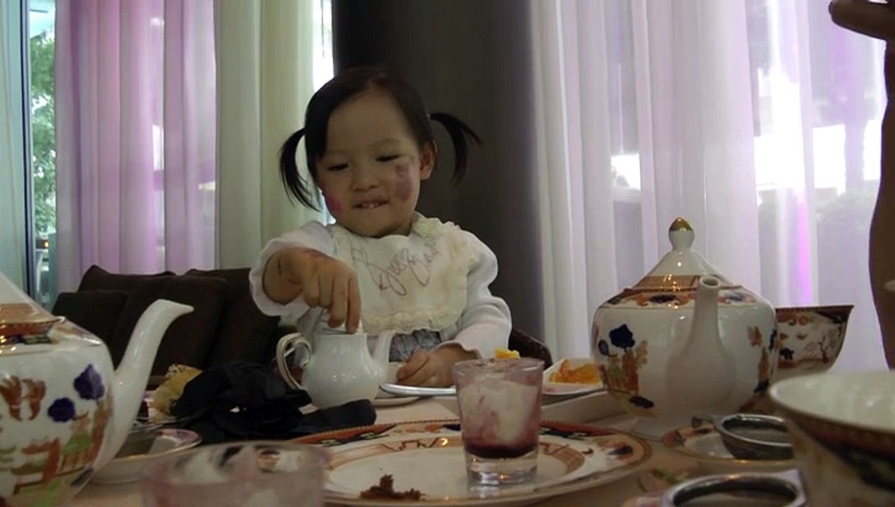 Girl Having Afternoon Tea