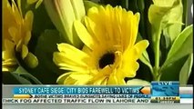 BBC News subtitles December 23, 2014 Sydney cafe siege City bids farewell to victims