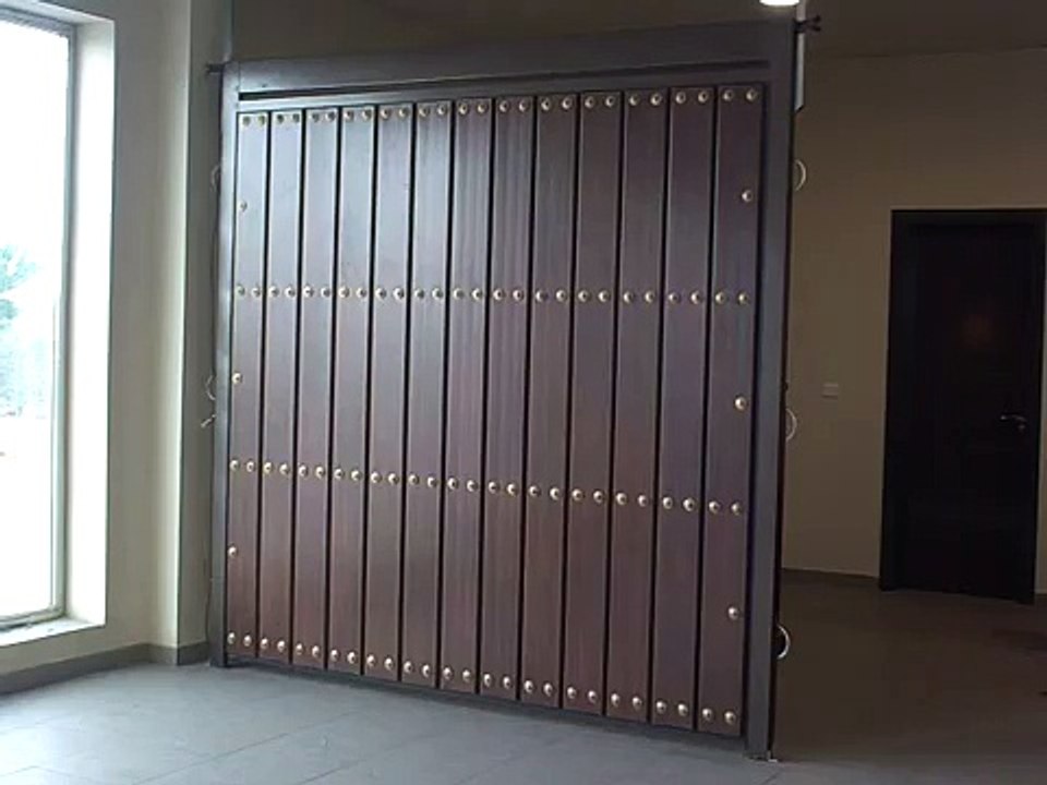 Puerta Automatica Basculante no desbordante. Puertas Cifuentes