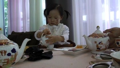 Girl Having Afternoon Tea