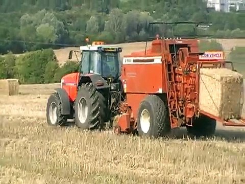 Massey Ferguson 8160 with Hesston 4900 Big Baler