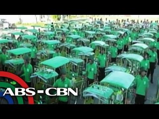 Yolanda survivors receive new pedicabs