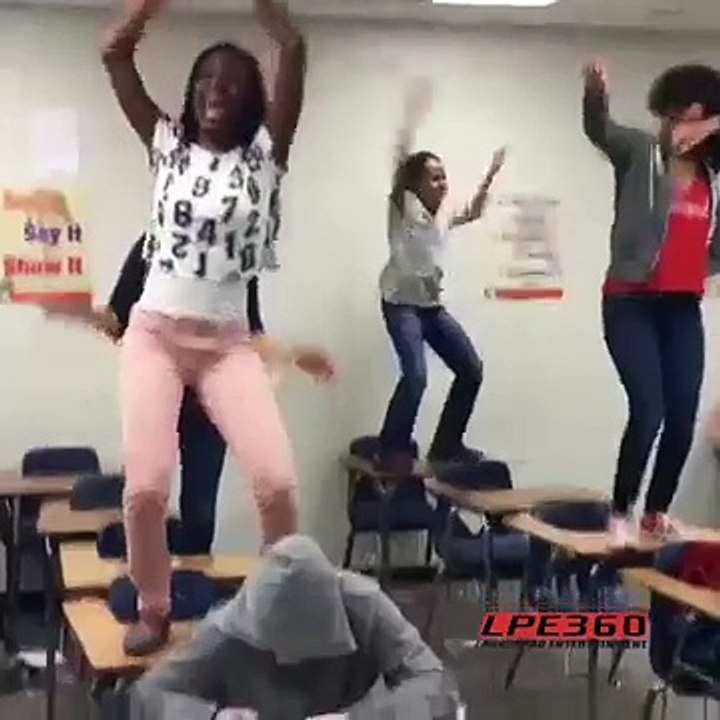 Dancing Girl Knocked Off School Desk and Falls - Insane Reaction
