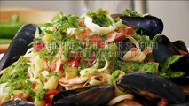 Fettuccine with fresh seafood and a green harissa dressing recipe - Tunisian Cuisine