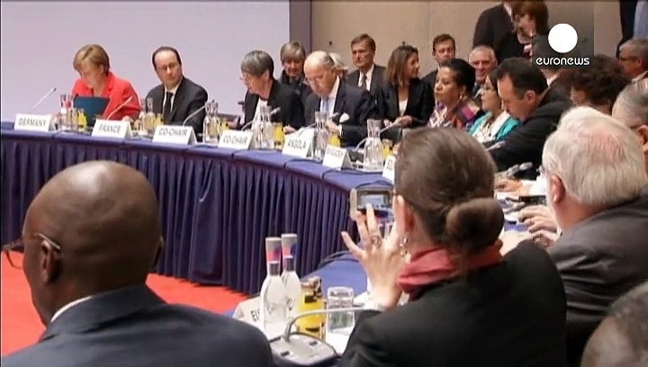 Merkel and Hollande pledge action on climate change