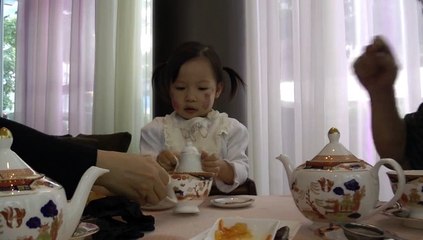 Girl Having Afternoon Tea*