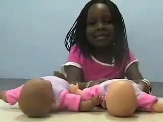 Black doll White doll