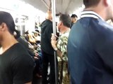 Crazy girl shouting Hallelujah in the F train