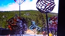 vertical axis wind turbines vawt as wind kinetic sculptures  in garden in urban area