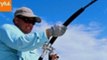 Strong Fisherman Runs on Beach to Reel in Shark