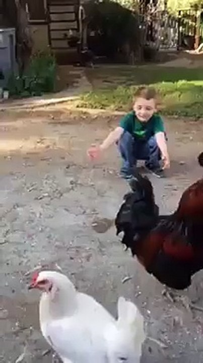 kid and hen hug