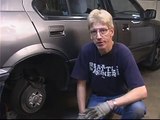How to Replace Rear Brake Pads : Removing the Final Two Bolts from the Caliper