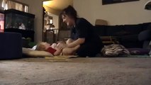 Baby boy laughing while mom tickles his cute belly