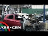 Car slams into post, catches fire