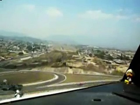 Cockpit view of a jet landing in Tegucigalpa, Honduras. Full landing