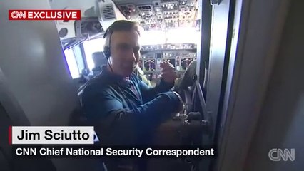 The Chinese navy warned a U.S.surveillance plane flying over artificial islands