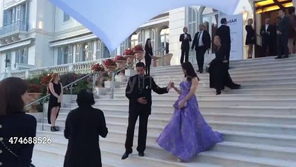 Aishwarya being photographed at the AmFar Gala in Cannes 201